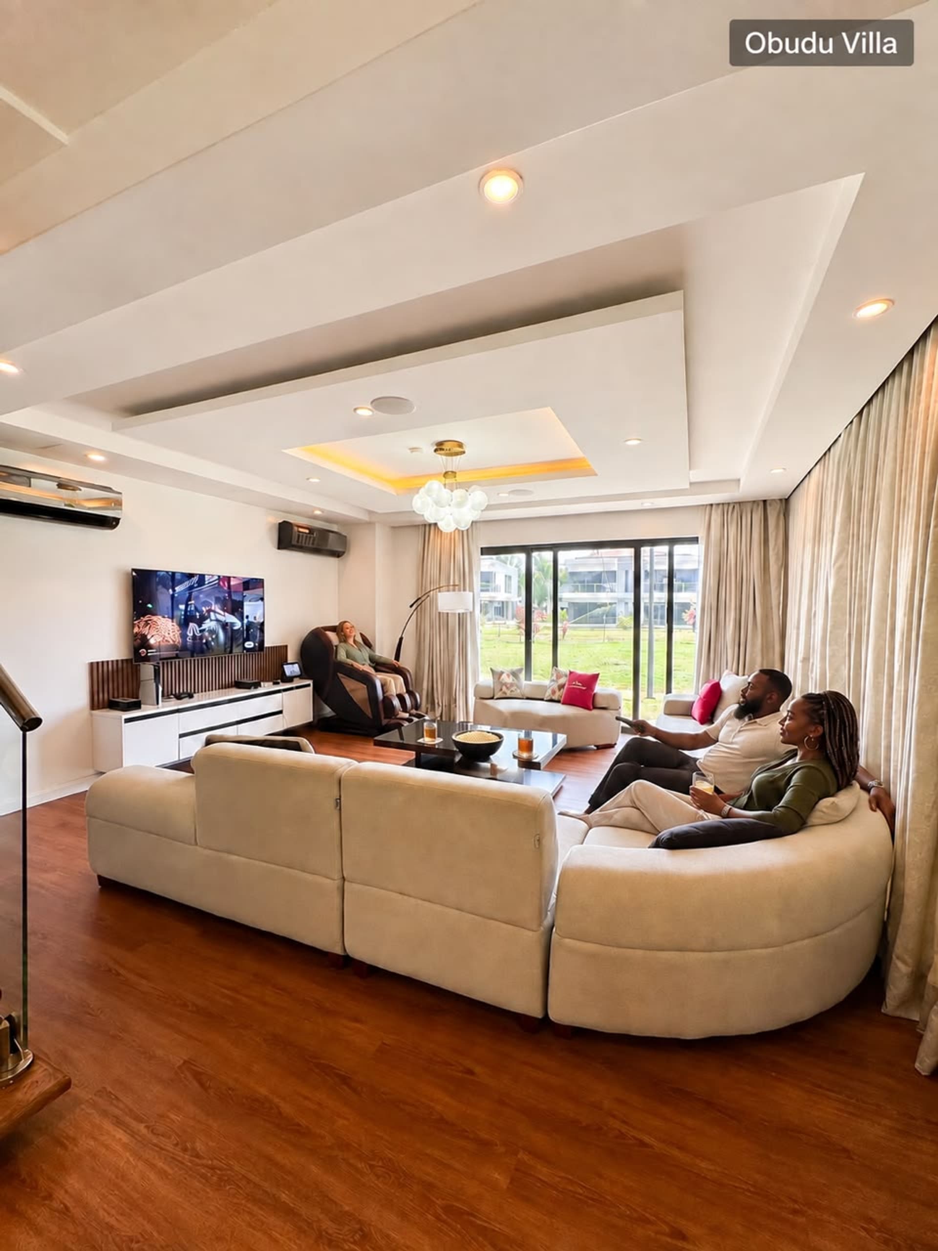 Guests relaxing together in a furnished lounge